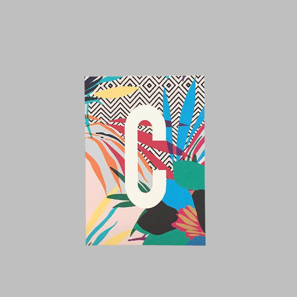 A5 Monogram art prints by Kitty McCall, featuring bold, colourful designs with personalised initials, perfect for adding a touch of vibrant and unique decor to any space.