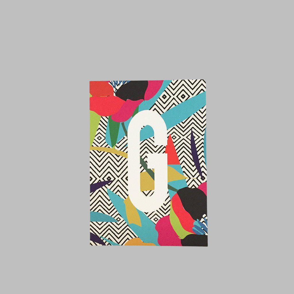 A5 Monogram art prints by Kitty McCall, featuring bold, colourful designs with personalised initials, perfect for adding a touch of vibrant and unique decor to any space.